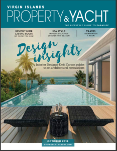 Cover page of Virgin Islands Property & Yacht, October Issue has a pair of luxury lounge chairs next to an infinity pool