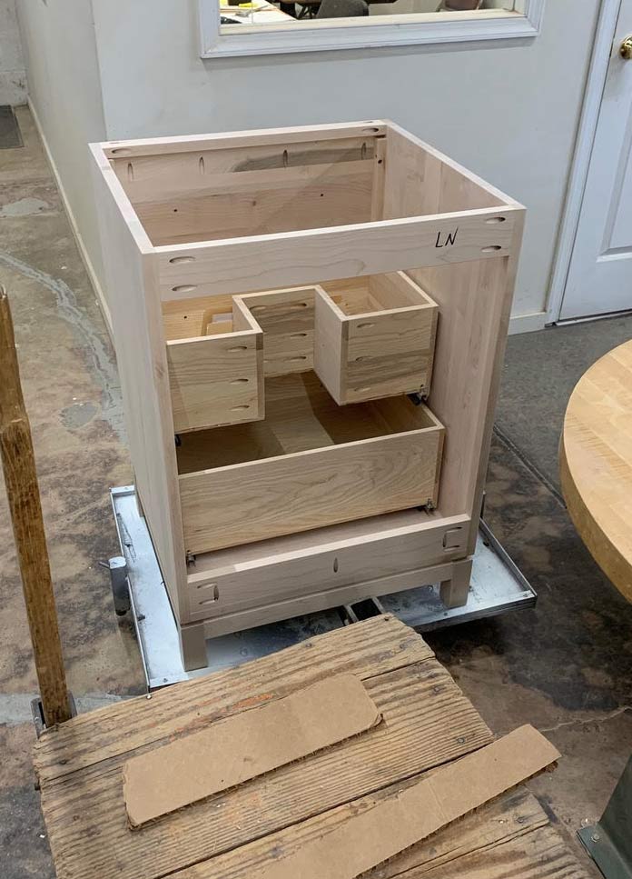 sustainable interior design materials were used to build a wooden bathroom vanity