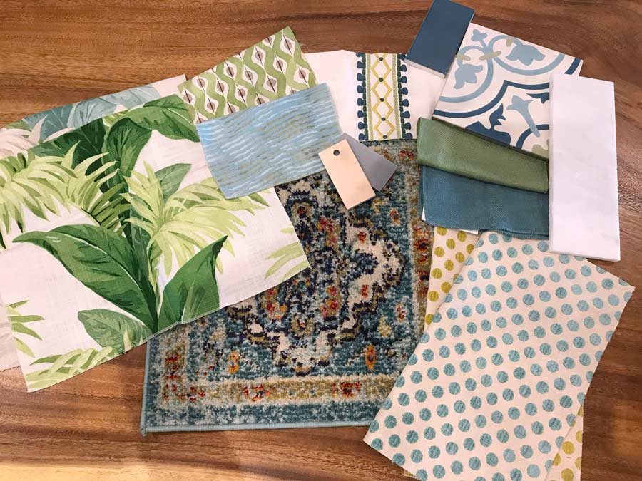 Tropical fabric swatches to use when creating mood boards with polka dot patterns, leaves and blue rug