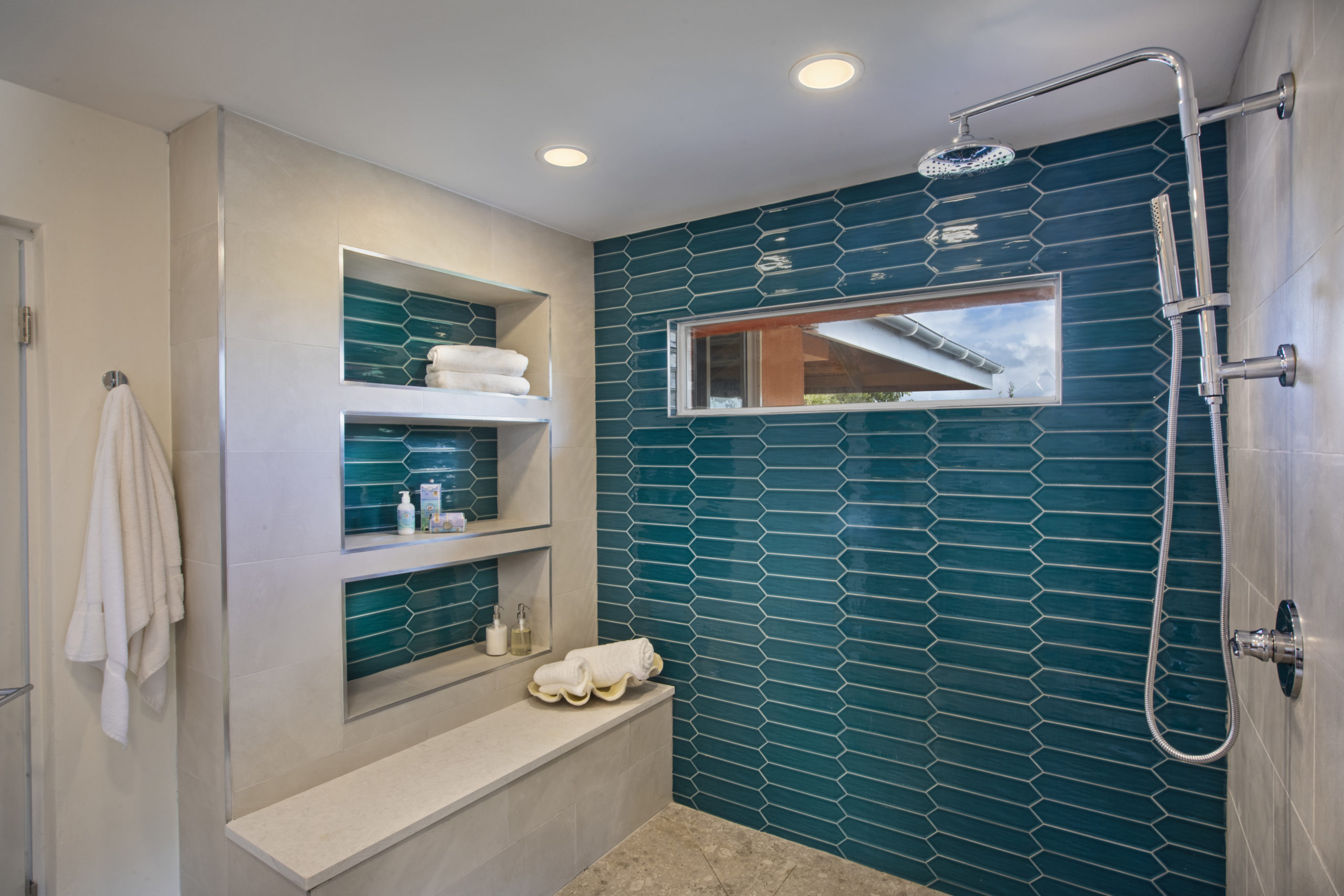 Tiled shower in bathroom