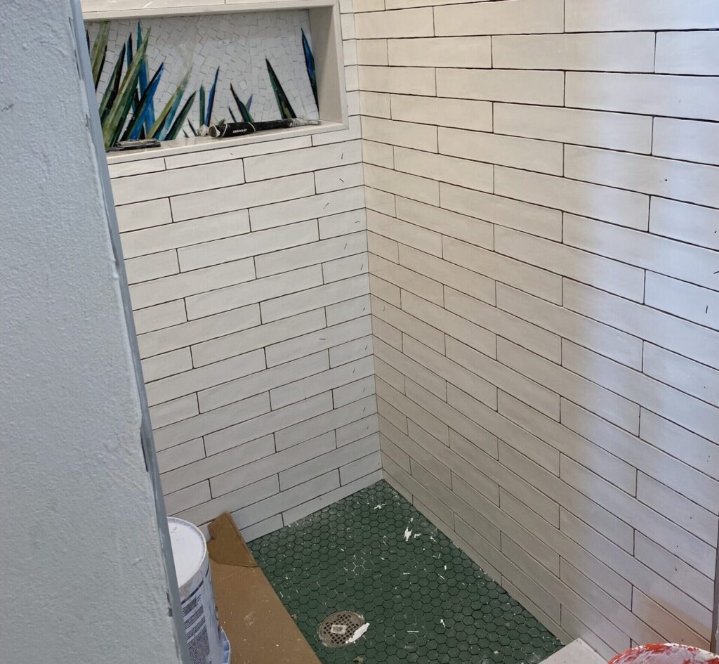 Bathroom Progress Photo of Tile Being Installed