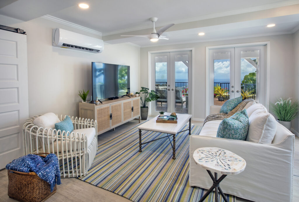 Rental Property Spacious Living Room Design after Renovation Completed with Beautiful Views of the St. Thomas in the Backdrop