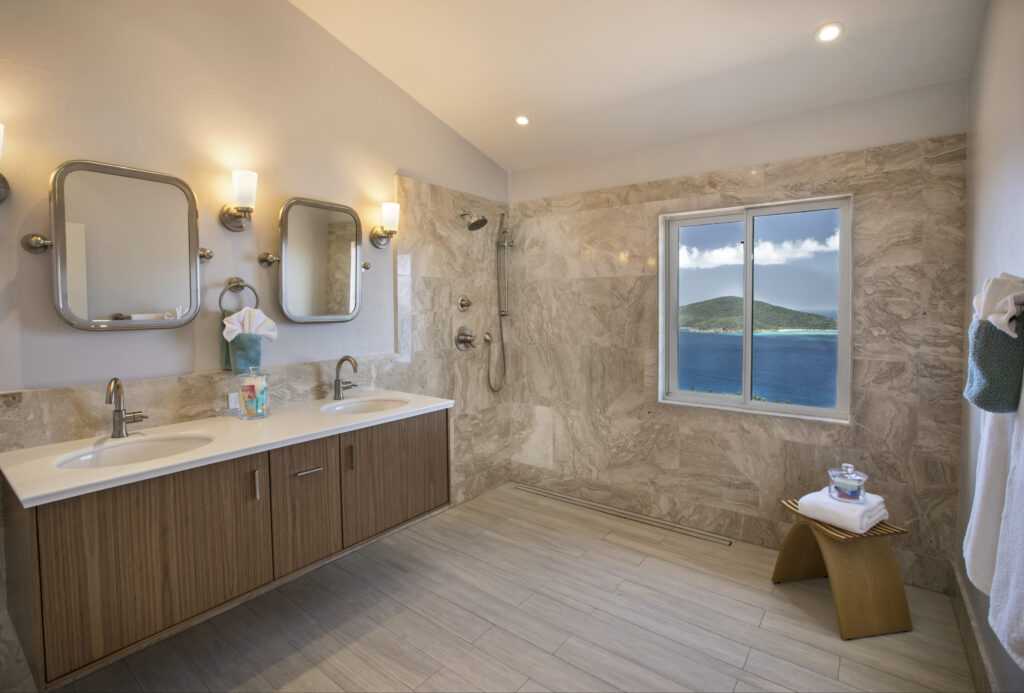 Modern Island Bath Design with Floating Vanity and Island Views