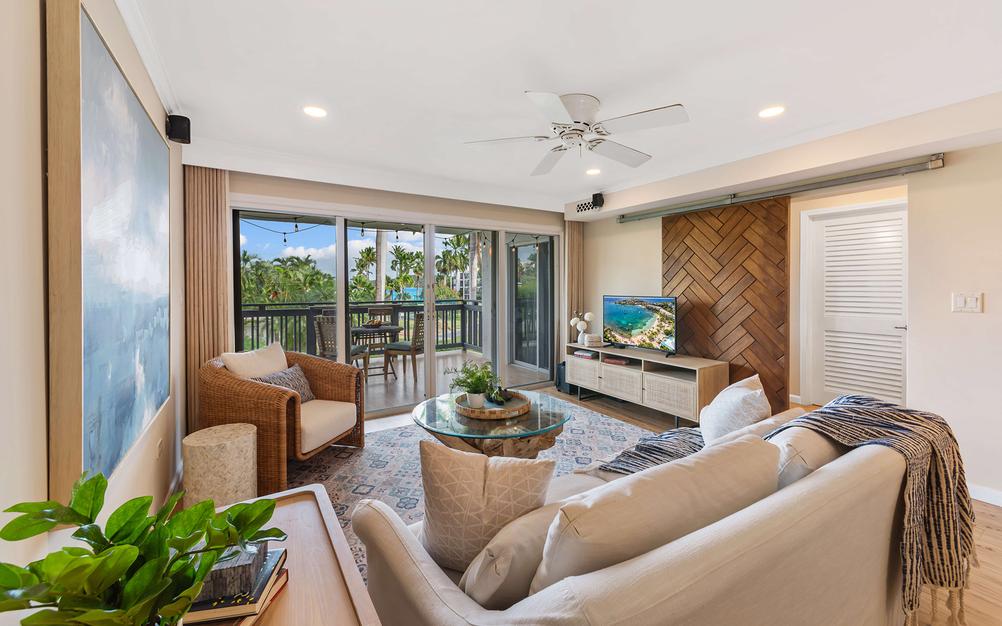 cohesive color palette living room after condo refurnishing service