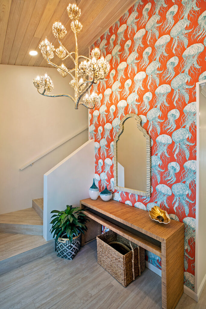 octopus wallpaper and chandelier